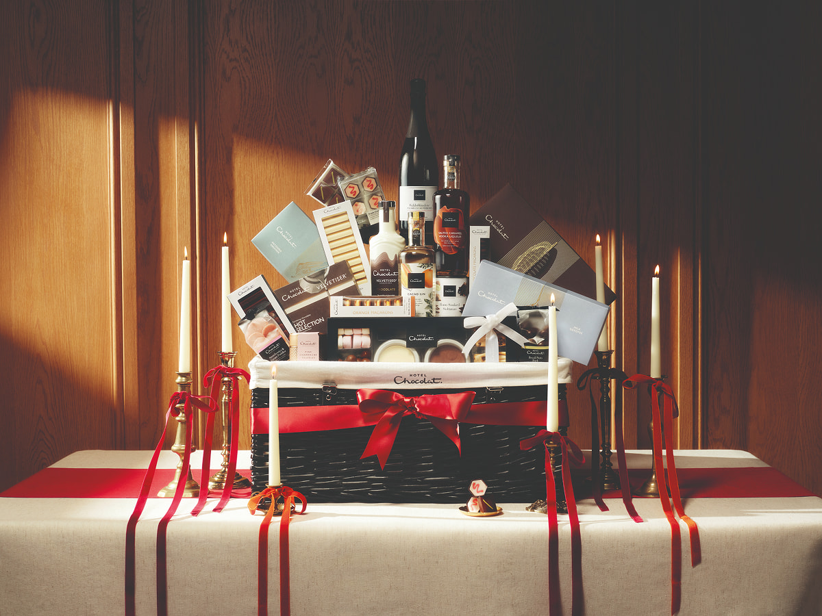 Hotel Chocolat gift hamper showcasing a selection of food and drink