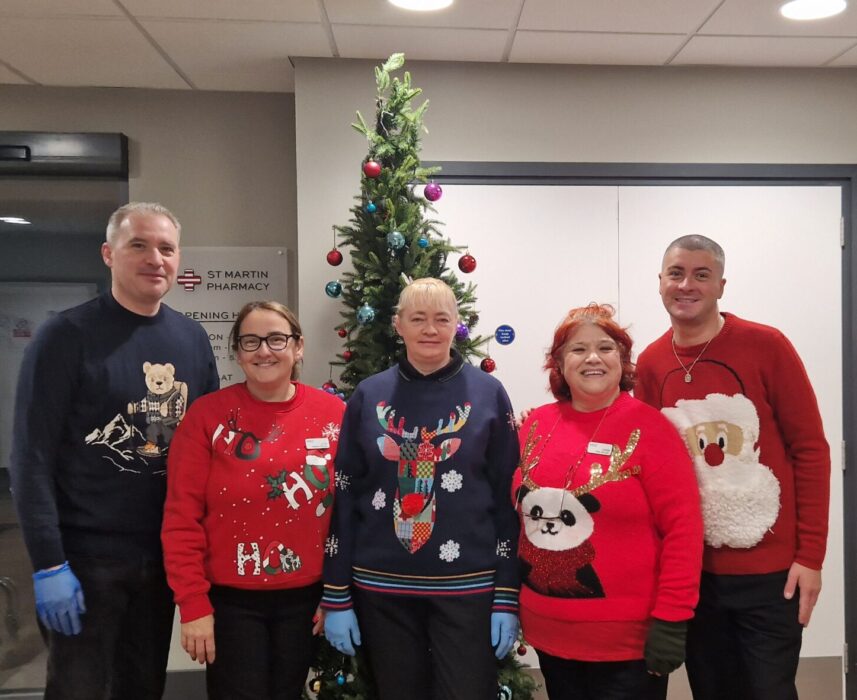 The team in their Christmas jumpers